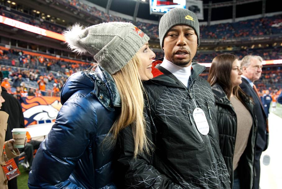 Lindsey Vonn e Tiger Woods al Mile High Stadium di Denver. Reuters